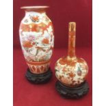 A Japanese Kaikemon spill vase of gourd shape painted with birds & blossom foliage on wood stand;