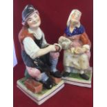 The Cobbler and Martha Gunn, a pair of large Victorian Staffordshire figurines