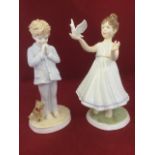 A pair of Royal Worcester figurines