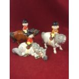 A set of three Beswick Norman Thelwell figurines, amusingly modelled with children on ponies. (3)