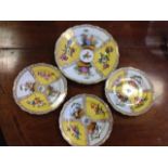 A set of three Meissen yellow ground plates, and one larger, all decorated with quartered alternatin