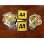 Two vintage numbered AA badges; and two others from the 70s. (4)