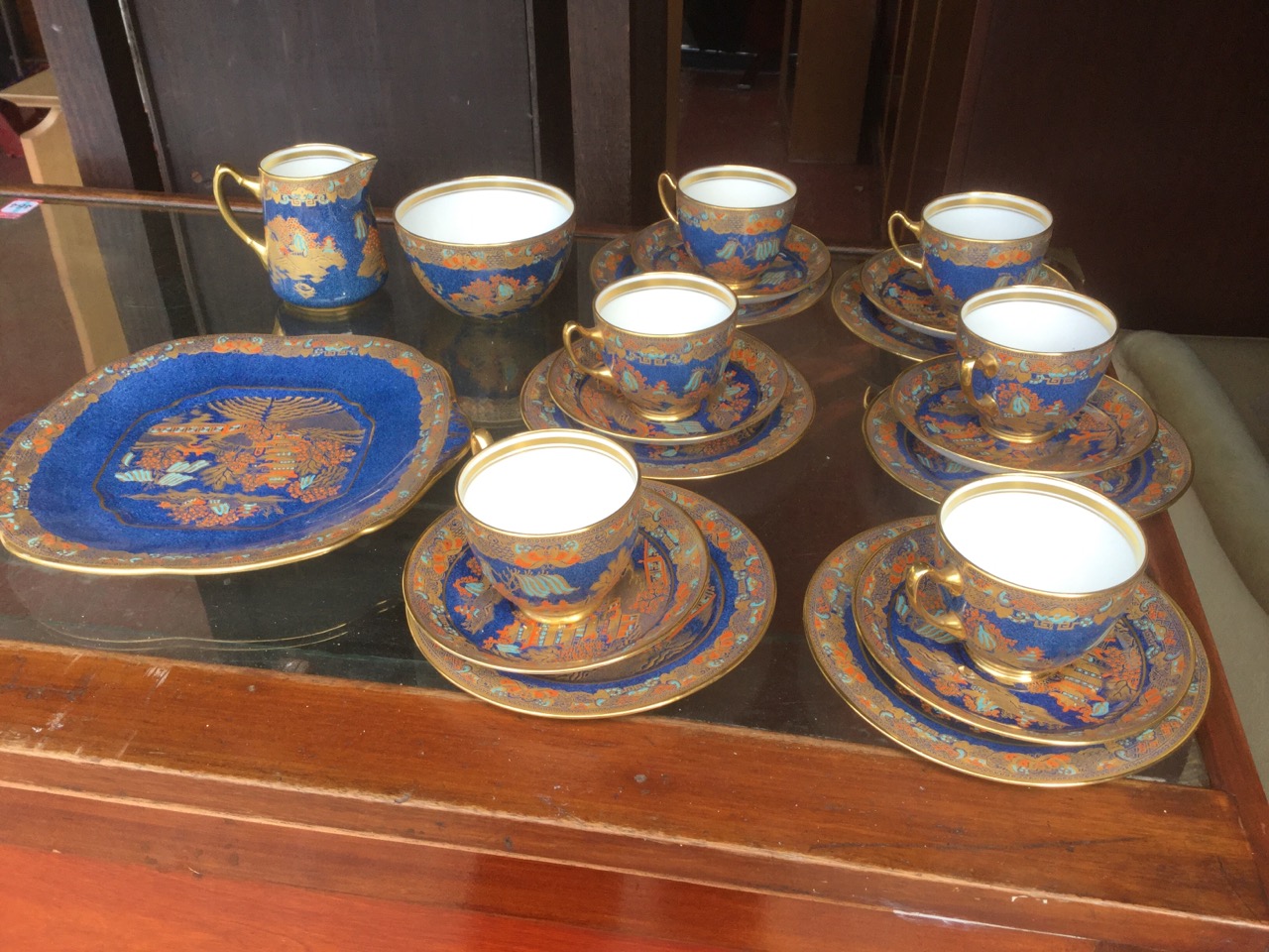 A Hughes & Co chinoiserie enamelled six-piece teaset