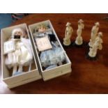 Two boxed porcelain head dolls with certificates, the dressed girls with stands