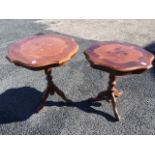 A matched pair of Italian marquetry occasional tables, the scalloped moulded tops on turned columns