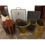 A brass fireside box embossed with galleons; two brass coal scuttles; a copper log bin