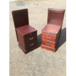 A pair of mahogany bedside cabinets