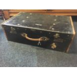 An Edwardian Flaxite suitcase with brass mounts