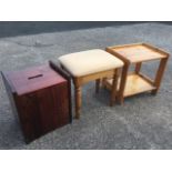 A pine stool with upholstered seat raised on turned legs; a stained pine box stool