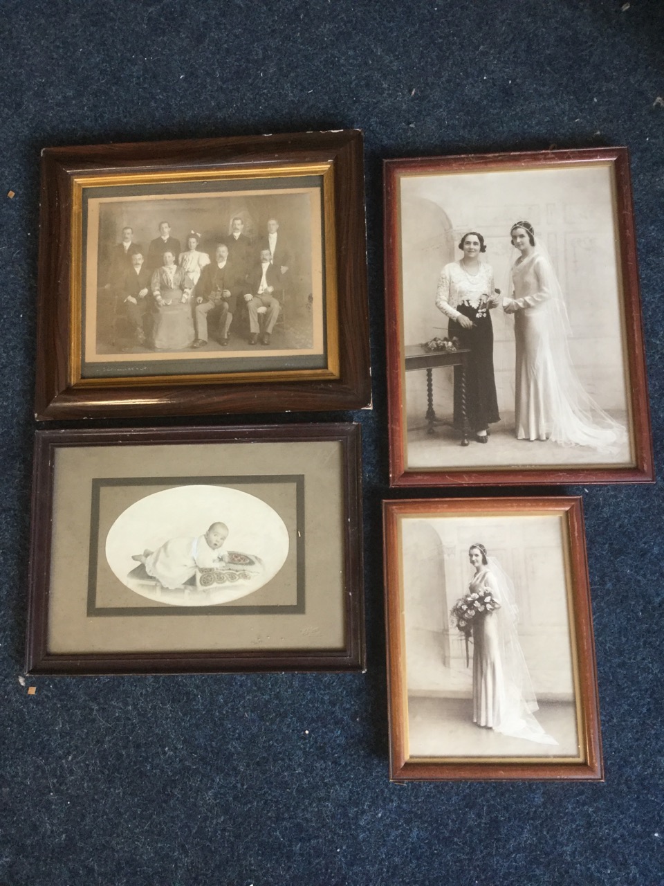 Four framed Edwardian family photographs. (4)