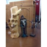 A log carved wood figure; a studio pottery wizard; and carved model of Shakespeare with removable