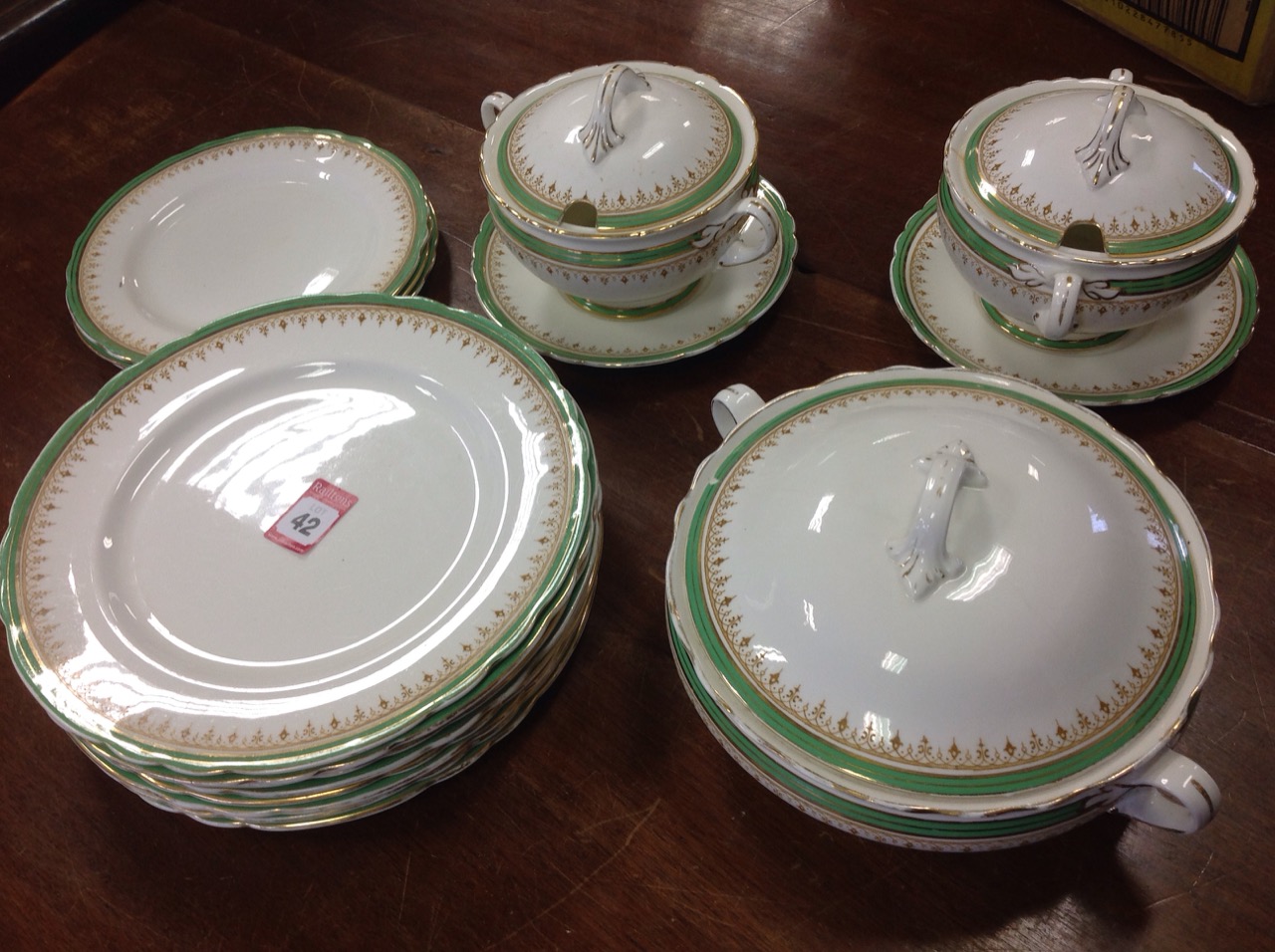 An Aynsley part dinner service with tureens & covers, dinner plates, etc., all decorated