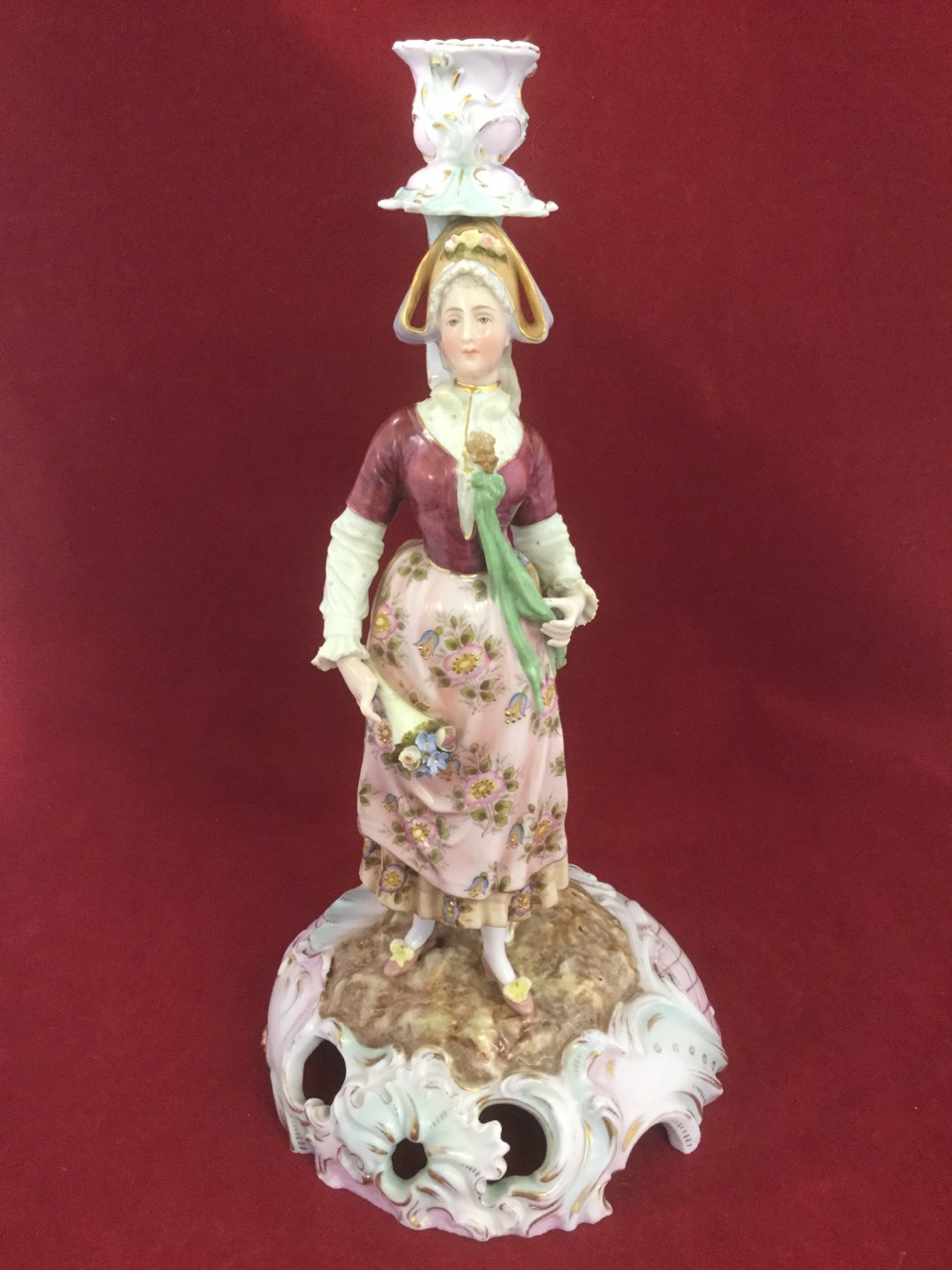 A Dresden porcelain candlestick