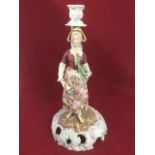 A Dresden porcelain candlestick