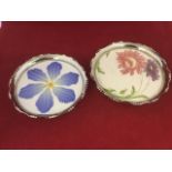 A graduated pair of Villeroy & Boch Mettlach coasters