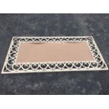 A large 6ft wrought iron frame