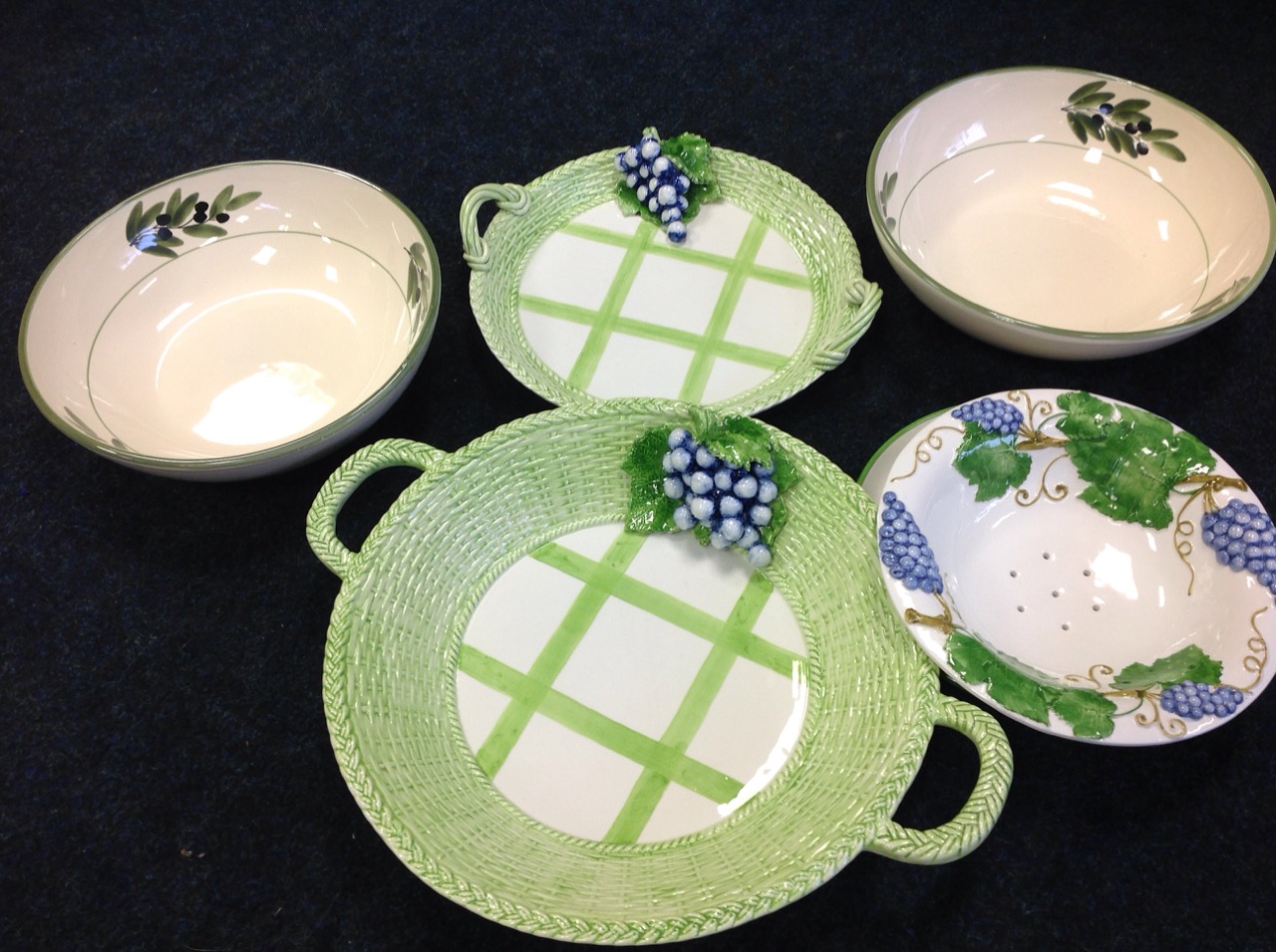A pair of Italian fruit bowls handpainted with olives; a graduated pair of basketweave moulded - Image 2 of 3