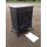 A VonHause 1850W stove heater with faux coals behind glass door, raised on angled legs.