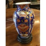 A Chinese vase decorated in the Imari palette