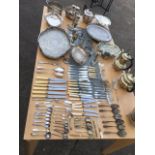 A quantity of silver plate including cake baskets, flatware, goblets