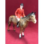 A Beswick Huntsman and horse, model 1501, in high gloss.