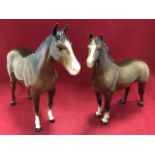 A Beswick horse, Imperial, model 1557 in brown gloss, and another, Welsh Cob, model 1793. (2)