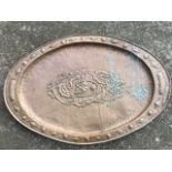 A large oval arts & crafts copper tray