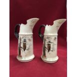 A pair of Austrian handpainted porcelain jugs