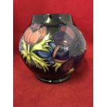 A tube-lined Moorcroft vase