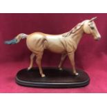 A Royal Doulton horse , Lammtara, model A250 (1999 - 2002), in chestnut.