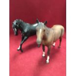 A Beswick horse - Black Beauty, model 2466 (1974 - 1989); and another, The Winner, model 2421