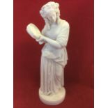 A nineteenth century parianware figure of a lady holding a tambourine