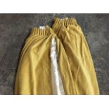 A pair of heavy gold coloured crushed velvet lined curtains - 7ft 8in. (2)