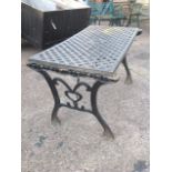 A rectangular cast iron table