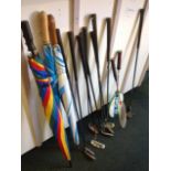 A set of nine miscellaneous golf clubs