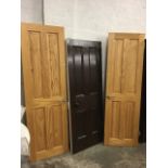 A Victorian four panelled door with original handle, rimlock &key; and a pair of modern pine doors