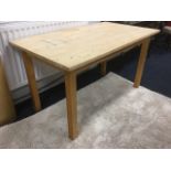 A rectangular 'scrub' top kitchen table