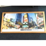 A large rectangular photographic print of Times Square