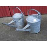 Two 2 gallon galvanised watering cans