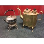 A large oval brass tea kettle on stand