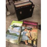 A record case containing a collection of vinyl LPs
