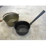 A Victorian brass jam pan with iron swing handle; and a Falkirk Foundry 4 pint pan with angled