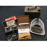 Three cased micrometers; a vintage petrol can; a bench vice; and boxed geometry instruments. (6)