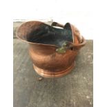 A Victorian copper coal scuttle