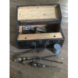 A toolbox with drawer, full of tools