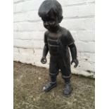 A little boy garden figure - lost his wheelbarrow