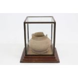 Mediaeval German Siegburg ware pottery urn of bellied form on spread foot, 7cm high,
