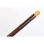 Regency rosewood walking stick with carved ivory bust of a gentleman,