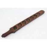 18th century Continental carved fruitwood gingerbread mould of paddle form,