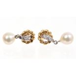 Pair gold (18ct) diamond and cultured pearl earrings - each with a circular yellow gold twist,